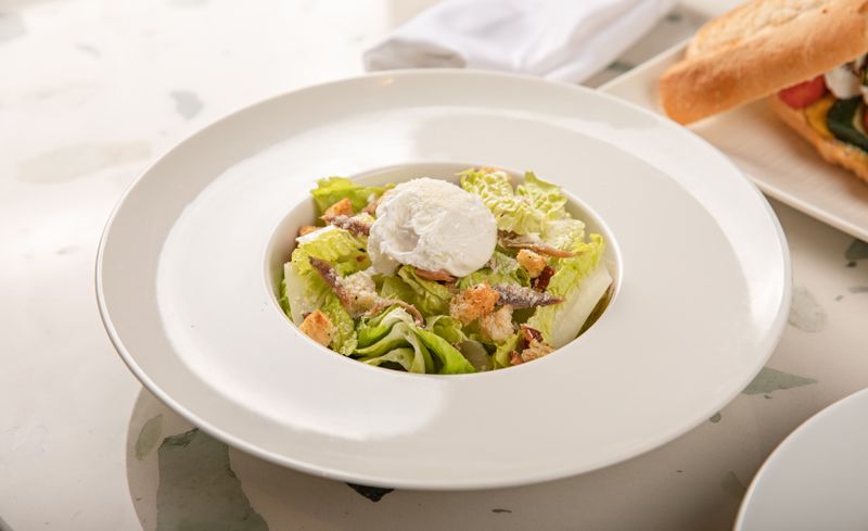 Caesar salad with croutons and parmesan