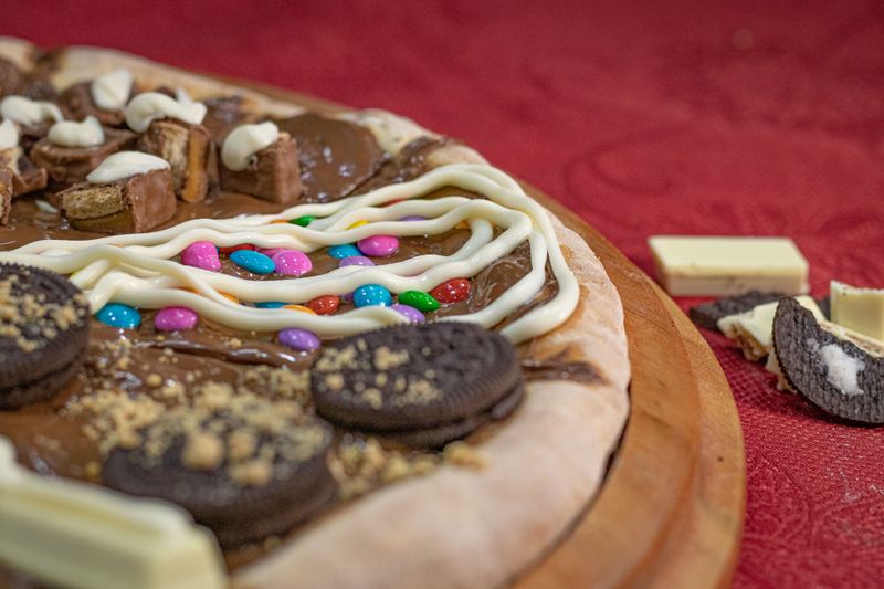 Nutella pizza dessert with strawberries